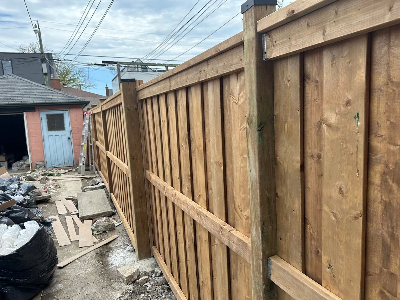 New cedar fence installation