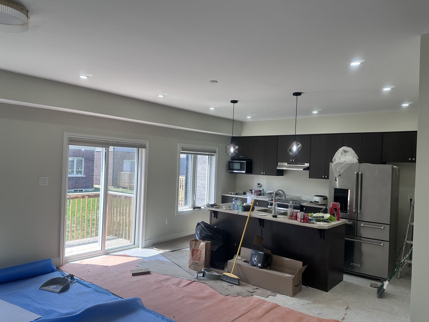 Pot lights and kitchen installation in progress